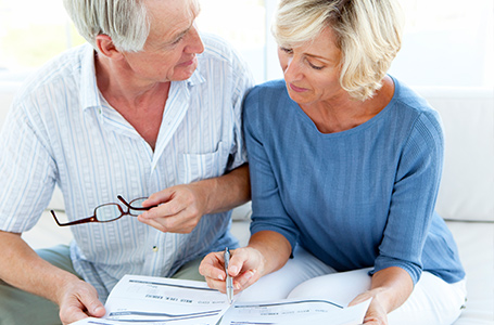 Man and woman reviewing documents